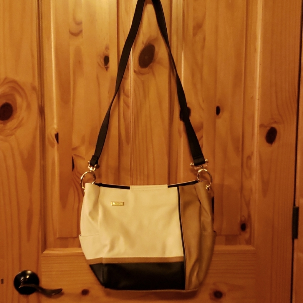 Miche Demi shell with strap & quick clip caribeaners.